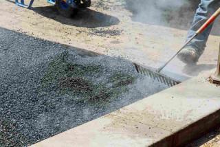 asphalt-paving-street-resurfacing-fresh-asphalt-c-2021-09-04-10-22-11-utc (1)